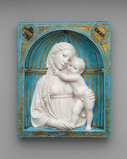 Virgin and Child in a niche by Luca della Robbia